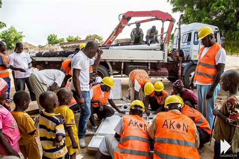 akon lighting|akon solar power africa.